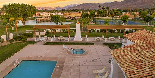 Aerial view of community pool, spa and tennis courts at Rio Del Sol.
