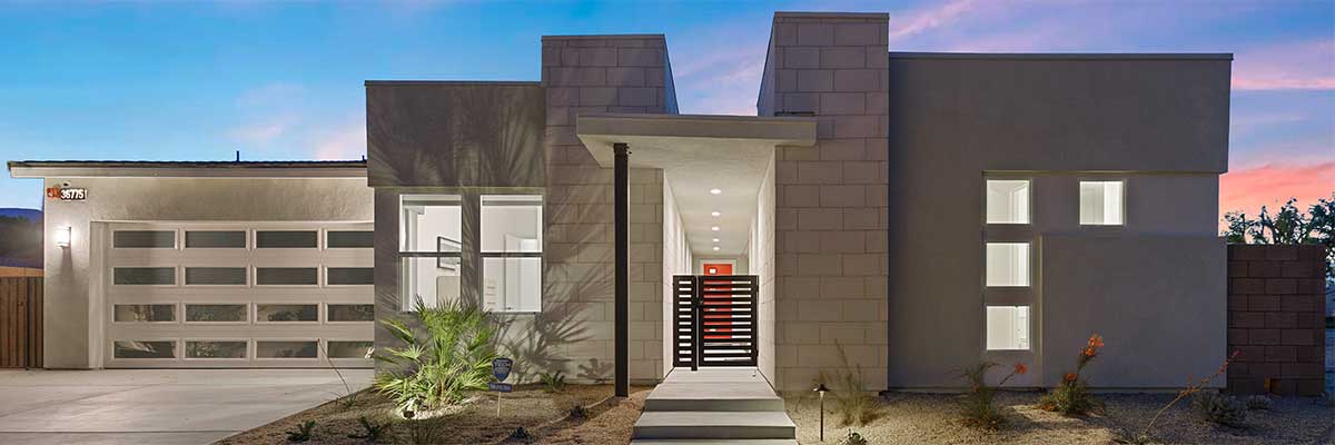 exterior front of Elements plan 3 home at dusk.